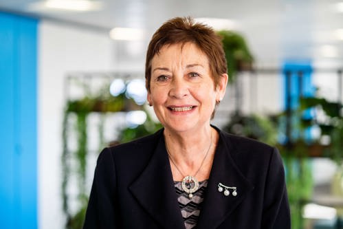 Chair of the Board Elaine Elkington smiles into the camera